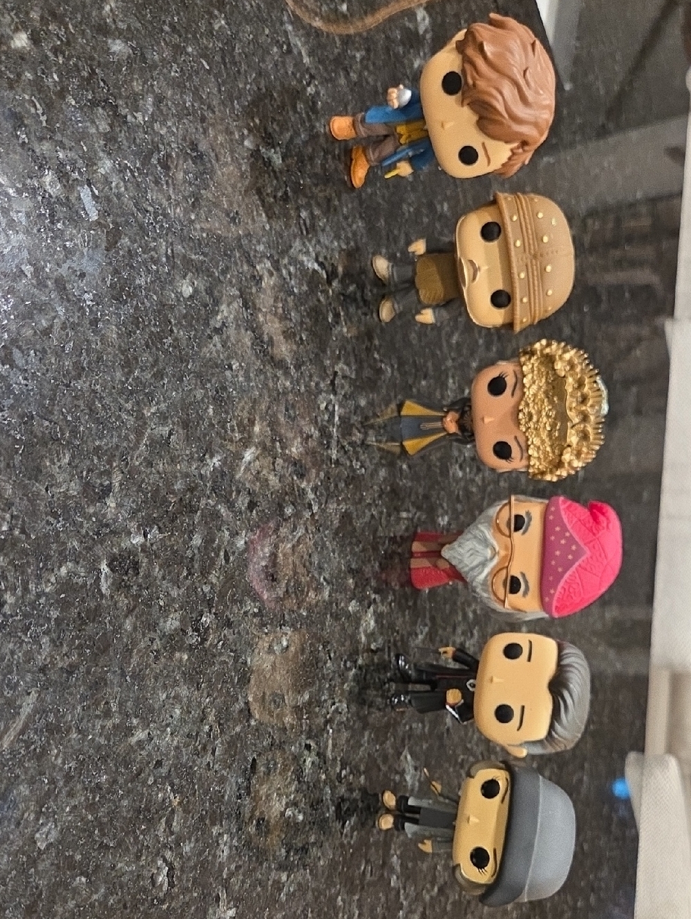 Funko Collectible Figures - Brown, Gold, Pink, Blue, Gray Accents